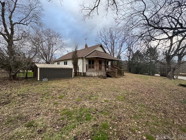 Looking for a home on a little bit of acreage? Here is the place for you! This charming two bedroom, two bath home is sitting on over 5 acres m/l. You will love the cozy feel of this home, some updates have been done to the home. Outside you will find a covered front porch that is perfect for enjoying the country views and you will also find an open back deck.  Also included is a guest house with a kitchen, bedroom and bathroom. Detached shop and outbuildings.  Buyer to verify all information on property.