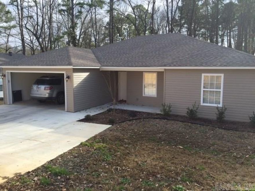 Beautiful new home close to town, safe neighborhood, decorative concrete throughout.  Less than 1 year old.