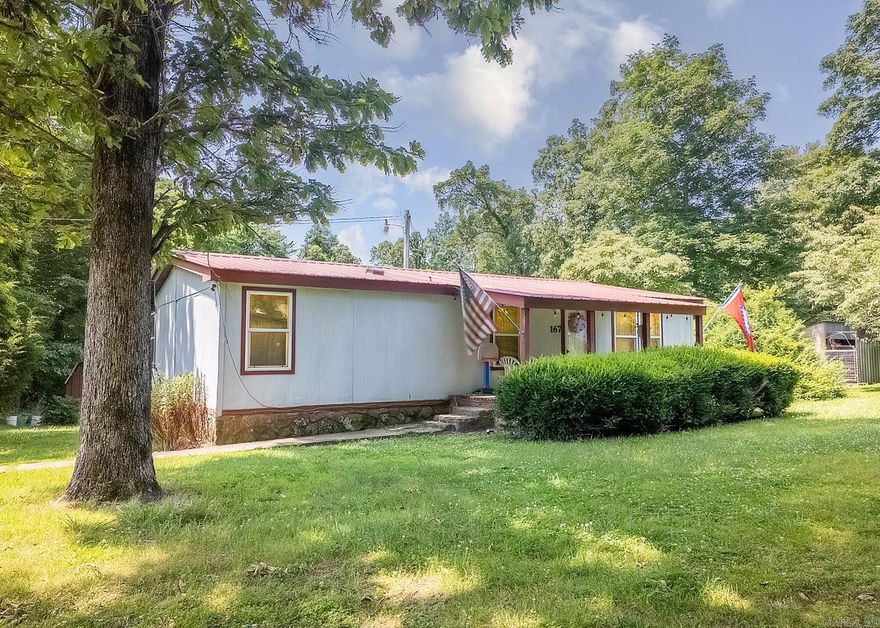 This rare opportunity features two homes on 20 scenic acres, just minutes from Mammoth Spring, Arkansas. Perfect for multi-generational living, guest housing, or rental income, the property offers flexibility and comfort in a serene Ozark setting. The first home sits on 11.92 acres with 2 bedrooms, 2 baths, and a bonus room that can serve as a third bedroom, office, or hobby space. Vaulted ceilings highlight the open living area, while the kitchen offers ample cabinetry and counter space. Enjoy central heat/air, a covered porch, fenced pasture, two outbuildings, and a heated/cooled shop with a concrete storm shelter. The second home, on the remaining acreage, is a freshly updated 2-bedroom, 1-bath residence with new paint, LVP flooring, and a remodeled bath. Features include central heat/air, a washer/dryer, refrigerator, oven, and low-maintenance metal roof. Outside, find a fenced garden, producing apple tree, walnut trees, and a large backyard. A 24x30 heated/cooled shop with lean-to adds storage and workspace. Just minutes to Spring River and Mammoth Spring State Park.