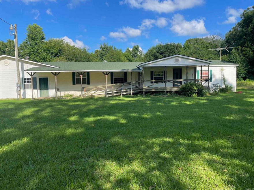 NINE ACRES...Don't miss this.  You could do so many things with all of this land.   This property is between Jacksonville and Lonoke and it's an easy 20 minute drive to the McCain Mall with lots of restaurants and shopping in North Little Rock.  This double wide manufactured home has a new security door.  There is a new perimeter fence.  It has a big 3 bay shop attached to the house.  It has a deck and a brand new AC unit ( May '24).  Get some animals, start a garden, sell an acre or two and call this place home.  See it today. NO LONGER UNDER CONTRACT- THRU NO FAULT OF SELLER OR PROPERTY-- Property is being sold AS-IS.  Please turn off lights and Lock security door when leaving.