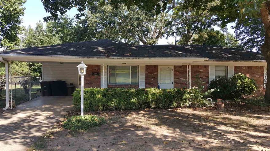 What a great home for the money!! New floors through out. All this home needs is a little paint! 3 bedrooms and 2 baths. Great shop inside the fully fenced back yard.  Seller is willing to pay buyers closing costs.