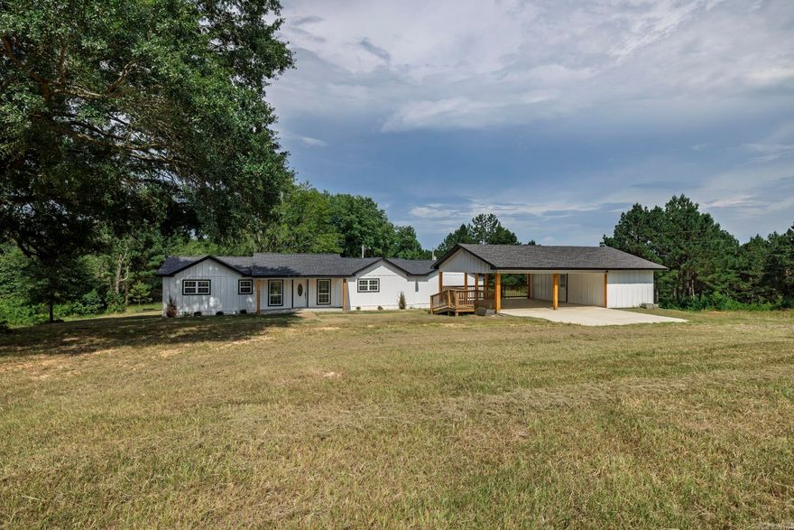 This beautifully renovated 3-bedroom, 3-bath home sits on over 16 acres of serene pastureland, offering breathtaking views and a peaceful, country setting. The open-concept living area is perfect for entertaining, with modern updates throughout. The master suite features a luxurious, oversized walk-in shower and a spacious closet. Enjoy outdoor living on the gorgeous back deck, ideal for relaxing and taking in the scenery. The property also includes a charming carport with an attached workshop, as well as a smaller storage building for added convenience. Located just a short drive from Arkadelphia and I-30, this home offers the perfect blend of country living with easy access to nearby amenities.