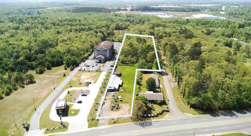 Great redevelopment.  Great for triplexes, storage, warehouse, retail, etc  A total of 2 tracts. Tract one has 95 feet wide on Hwy 365 - then in the back it is 163 feet wide. The second lot is 163 feet wide. The total length of both tracts are 1455 feet. Level lots, there is a small pond on the back side of the lot.
