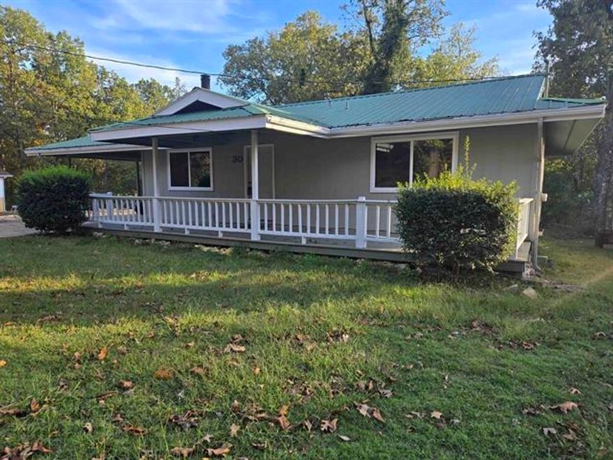 Fully Remodeled! 3 Bedroom 1.5 Bath near Lake Sequoyah. Several new windows, paint, 20 cubic foot refrigerator, dishwasher, gas water heater and more. Vaulted ceiling in the main living area. Ben Franklin fireplace with a new gas log adds to the charm. Gas Range with venthood. Central HVAC heat is gas. Carpet and vinyl flooring. Kitchen/dining combo with lots of cabinet space. Laundry room. Front and back porches to enjoy the outdoors. One-car carport and a concrete driveway. This home can also be purchased with owner financing options available. Each adult will be required to complete an application.  We do credit and criminal background checks. If you are renting, an additional charge for pest control will apply.