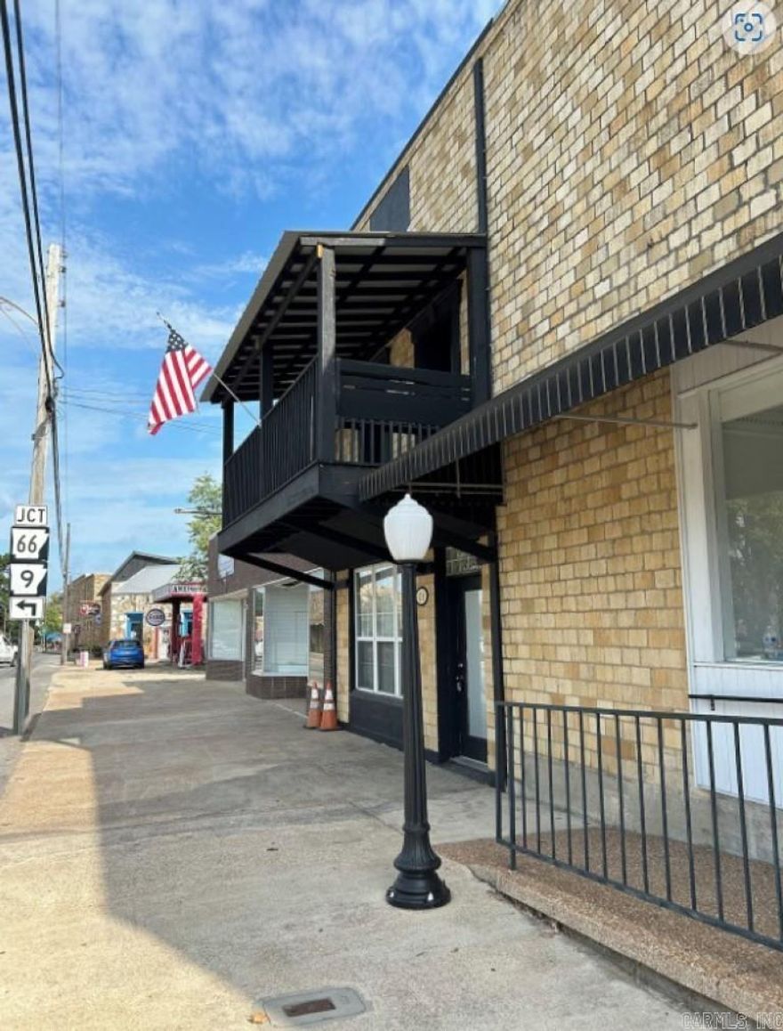 **Prime Commercial Property with Nightly Rental Option – Fully Furnished 2-Story Building!** **Location:** 118 E Main St, Mountain View, Arkansas  **Size:** 3,040 sq ft This exceptional 2-story commercial building offers a unique investment opportunity, blending business potential with short-term rental income!  **Main Features:** - **Ground Floor:** Spacious commercial area perfect for retail, office space, or other business ventures. - **Second Floor:** Fully furnished, stylish 2-bedroom, 1-bath apartment available for **nightly rental**, offering excellent income potential. - **Outdoor Space:** Enjoy both front and back **balconies** with beautiful views, perfect for relaxing or entertaining guests. The property’s prime location and versatile layout make it ideal for entrepreneurs looking to invest in a **live/work** space or those seeking **rental income** from the upstairs unit.  Listing number 02395   Price - $250,000. Contact us today to schedule a tour and explore this rare opportunity!