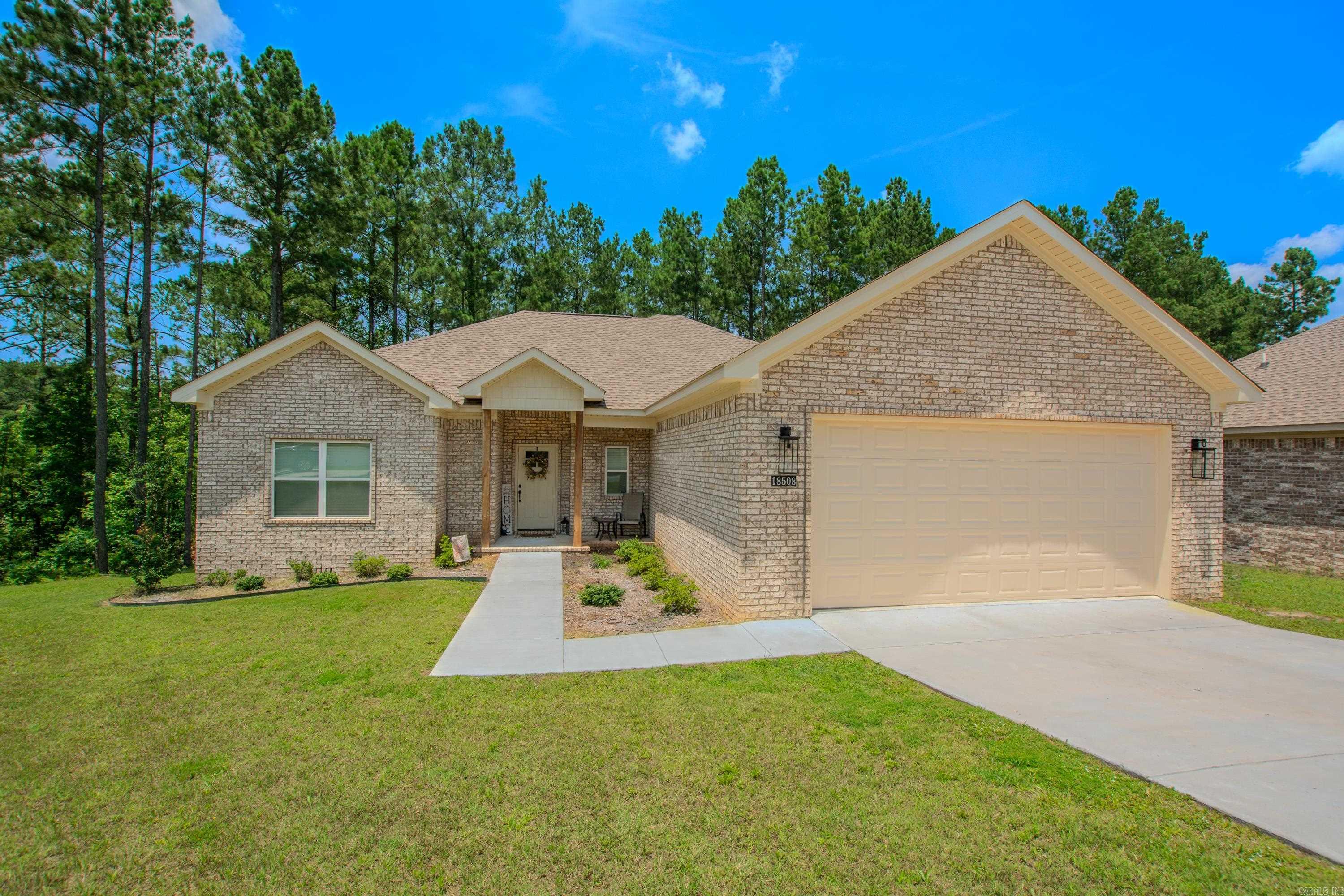 This BEAUTIFUL all brick home has an open layout with a split floorplan. Luxury Vinyl flooring through out the main areas and in the primary suite. The guest bedrooms have carpet. It has granite countertops stainless-steel appliances and a pantry. Enjoy the natural light provided by the large windows! This home has been well maintained and in a great subdivision! This is a MUST SEE!! Call and schedule your showing today!