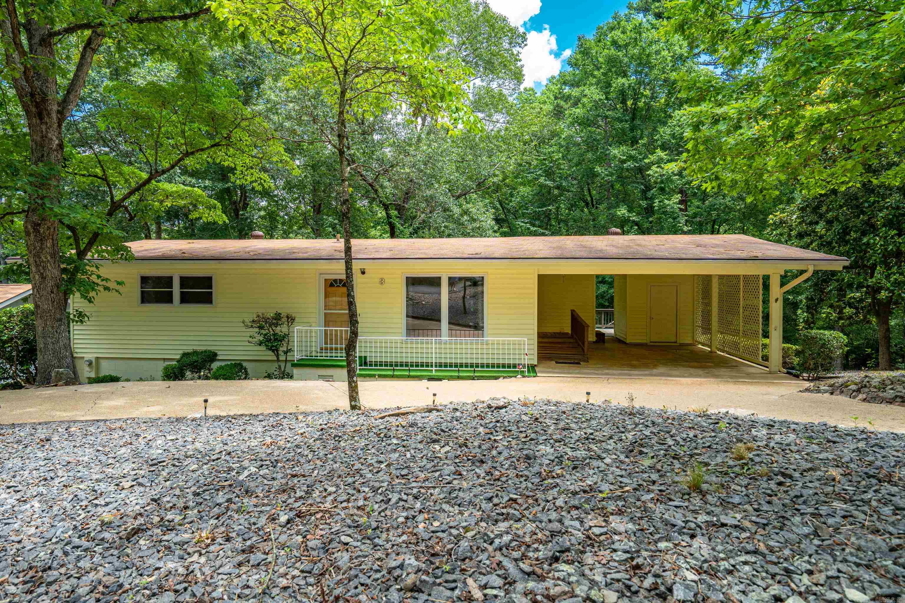 Tucked away on a quiet cul-de-sac in Hot Springs Village, this charming 2-bedroom, 1.5-bath home offers comfort and convenience with thoughtful extras throughout. Laundry room, walk-in closet, updated bathroom, newer HVAC, carport, this home has been immaculately maintained! Most windows replaced with vinyl double pane. Enjoy the sunny vibes in the enclosed sunroom, unwind on the private deck, take advantage of the lower-level workshopāperfect for hobbies or extra storage. This home is as practical as it is welcoming.