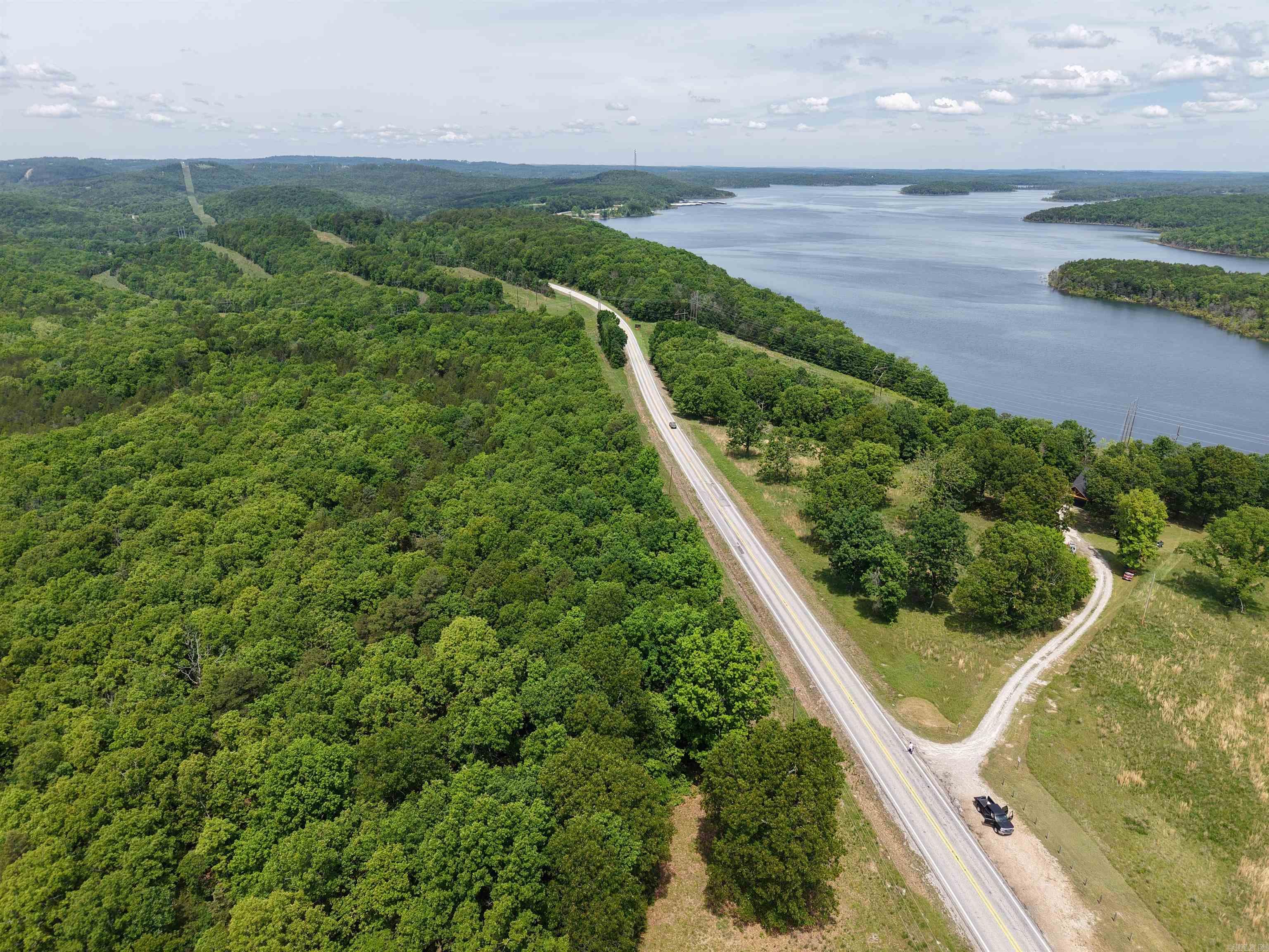 This 11.24-acre tract offers the perfect blend of location, versatility, and opportunity. With prime highway frontage and no restrictions, this property is ideal for development, building your dream home, or creating a private getaway. Situated less than a mile from the world-famous Norfork River and just minutes from Lake Norfork and a public boat ramp, this land provides easy access to some of the best fishing and boating in the Ozarks, making it an even more desirable area for recreational use. This property is even located near the popular Whispering Woods restaurant. Whether you're looking for hunting land, a recreational retreat, or a site for a cabin or vacation rental, this property has it all. This land has been newly surveyed for peace of mind. Donāt miss this rare opportunity for only $99,000ā the possibilities are endless! Contact us today to schedule a showing!