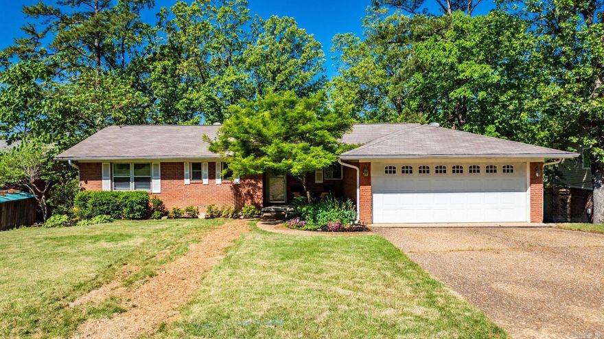 Welcome to this thoughtfully updated 5-bedroom, 3-bath home, offering 2,954 square feet of comfortable and versatile living space. The renovated kitchen features granite countertops, stainless steel appliances, and a stylish, functional layout perfect for everyday use and entertaining. All three full bathrooms have been beautifully updated, blending classic charm with contemporary finishes. Refinished hardwood floors run throughout the home, adding warmth and character.  Relax or entertain on the spacious screened-in porch — perfect for enjoying the outdoors year-round. Downstairs, a large bonus room, two additional bedrooms, and a full bath provide plenty of space and flexibility. One of the bedrooms features French doors opening to the patio and would make an ideal home office. Make yourself comfortable, this one has it all!