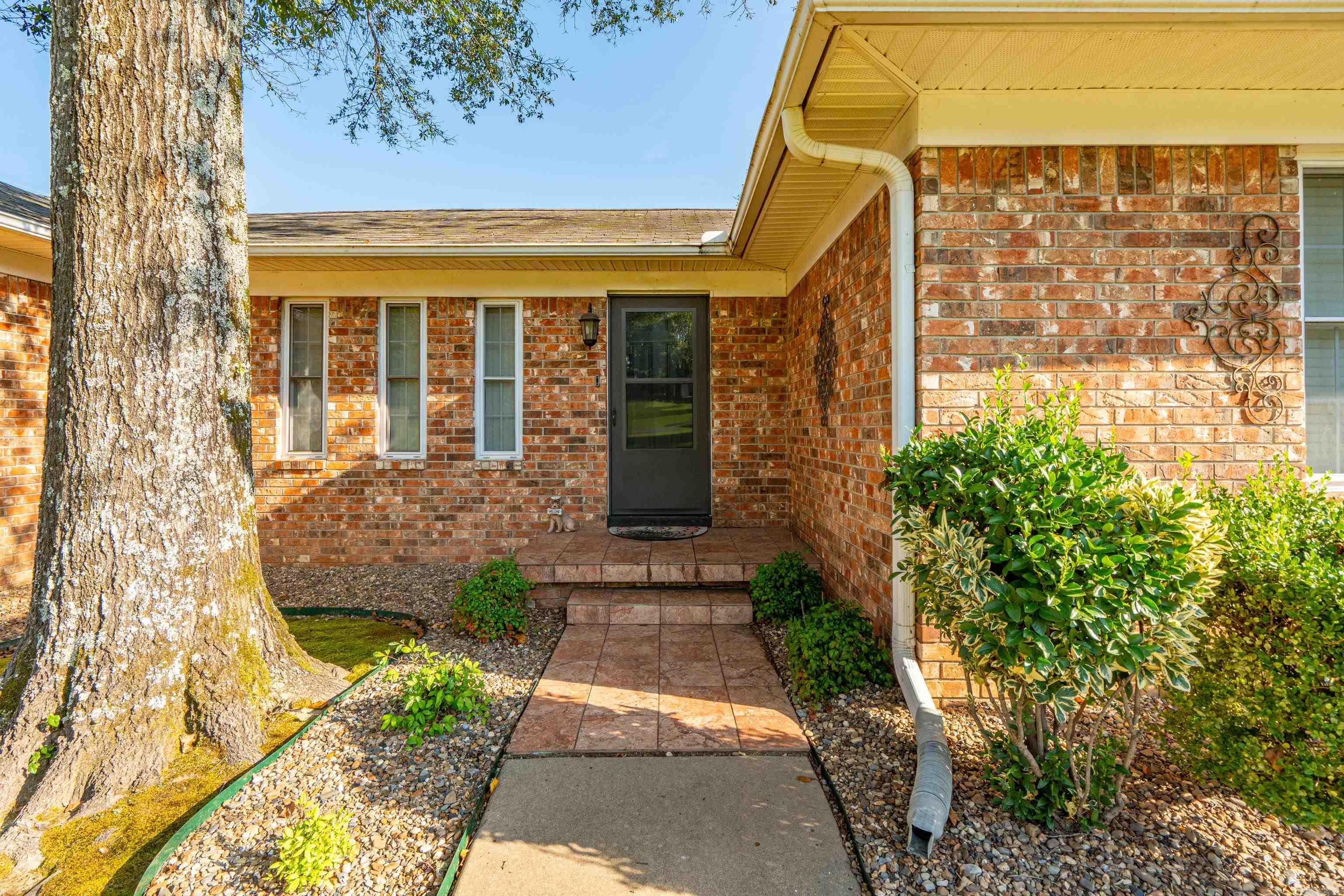 CHARMING and meticulously maintained, this 3 bedroom, 2 bath home offers peaceful country living just minutes from Lake Hamilton School. Situated on 2.25 acres with a fenced yard, this property features mature pear trees, a serene creek along the edge of the property that flows into Little Mazarn, and plenty of space to enjoy the outdoors. Inside, you'll find 1614 sqft of inviting living space with a warm, welcoming feel. The impressive 60X50 shop provides endless possibilities, complete with an unfinished bathroom and abundant storage or workspace. Perfect for those who appreciate privacy, nature, and room to grow. This one is MOVE-IN ready and absolutely adorable! RUN don't walk before you miss your chance to make it yours!