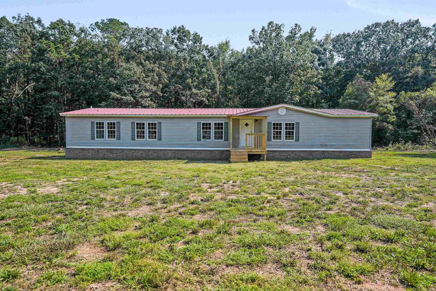 Updated home on 5 acres with the opportunity to buy 5 more acres next to it! This home has a great amount of space - boasting 2,240 sq ft. You will be delighted to find a new metal roof, new floors, new paint, new central A/C, new toilets, remodeled kitchen including new, modern appliances, new wooden porches, new light fixtures, new doors, new water pipes, and a brand new septic system has been installed as well. Home is on a permanent foundation. Water provided by Toad Suck Public Facilities. Property is NOT in a flood zone according to FEMA Flood Map. Opportunities like this don't come around too often. Schedule a private tour now!