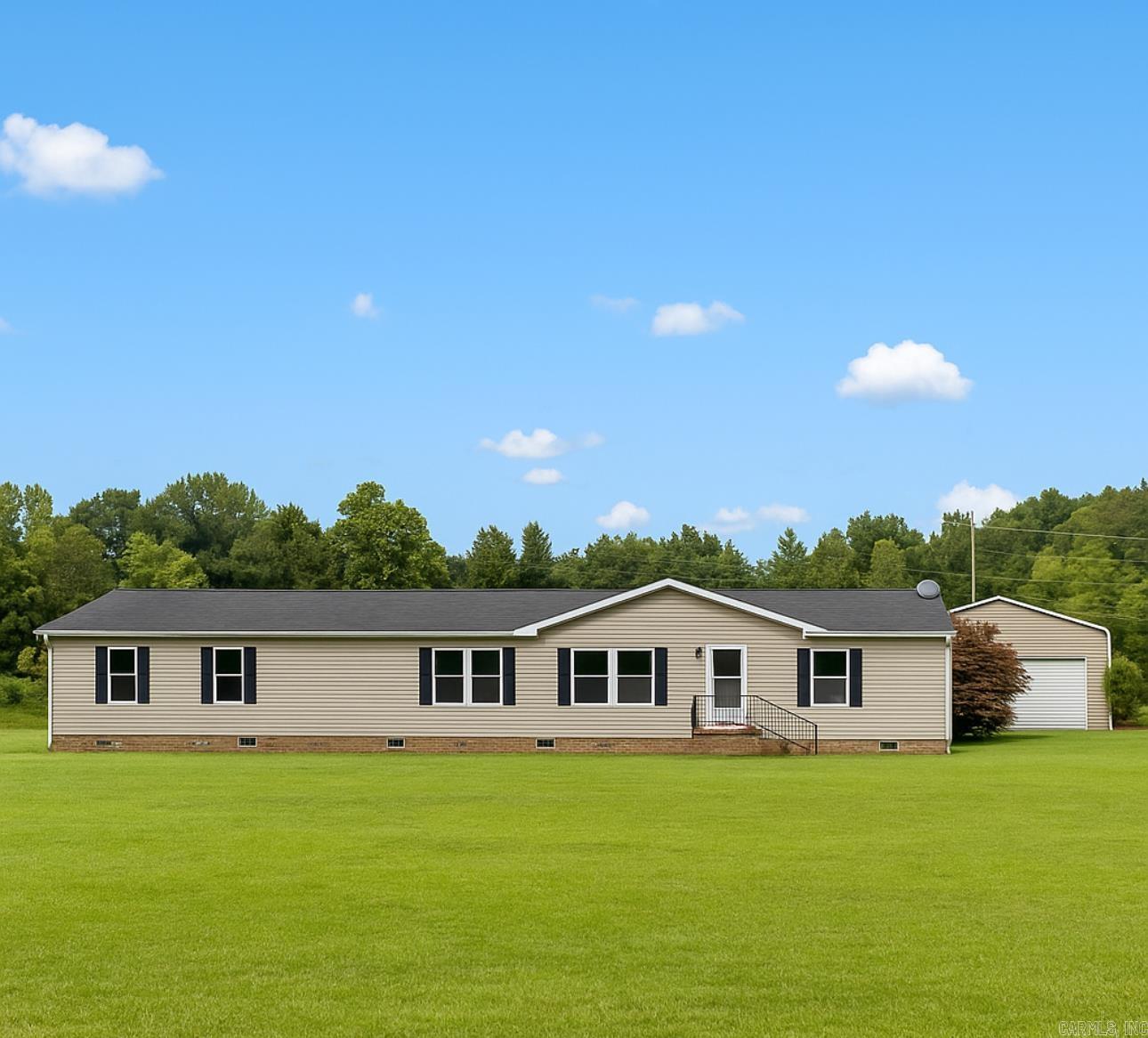 Mobile home on 3 acres-Needs Some TLC, Priced to Sell! Looking for a peaceful country property with big potential? This 3-acre lot comes with a mobile home that needs some fixing up perfect for a handyman special or investment property. Property Features: 4 bed/2 bath Mobile Home (needs TLC) 3 Beautiful Acres-room to expand, garden, or just enjoy the space. Large 30x40 shop with electric-great for projects, storage or your business. Plenty of space for animals, RVs, boats, etc. View of pond and privacy. Home needs work but Seller will replace roof before closing with an accepted offer. Motivated Seller--bring your Best Offer! Located in the Cabot School District. Photos show how property can look with some TLC and also current photos. ** Agents please see remarks **