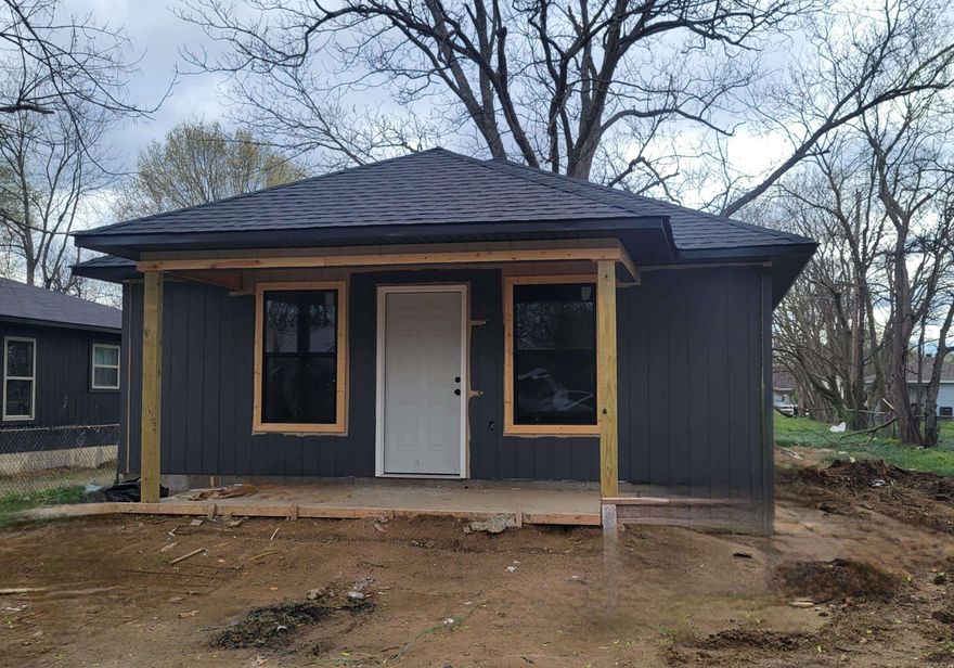 New construction in process. Home includes 3 bedrooms, 1 full bathroom, and separate laundry area. Home will include acid-stained flooring throughout, white cabinetry in kitchen and bathroom, gray interior paint. Home is all electric. Concrete patio and covered front entry. Chain link fence can be replaced with a wood privacy fence with acceptable offer.