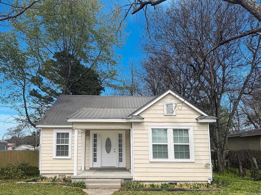 Updated and move-in ready! This 3 bedroom, 1 bath home offers approximately 1,254 square feet and is conveniently located within walking distance to the local junior high and senior high schools. Recent updates include new flooring and fresh interior paint throughout, a kitchen upgrade with updated countertops, new refrigerator, and new cookstove, plus major exterior improvements featuring a new metal roof (2025) and new energy-efficient double-hung, double-pane tilt-in windows (2026). The home also includes central heat and air for added convenience.