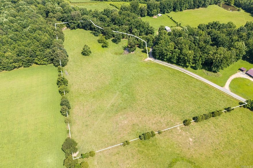 Endless Possibilities on 9.22 Acres! Tucked away at the end of a paved road, this beautiful 9.22-acre tract offers the perfect blend of peace and practicality. Whether you're dreaming of raising livestock, building your forever home, or just need a private spot for weekend fun, this land checks all the boxes. A pond is already onsite, ideal for watering animals or stock it and cast a line on a lazy afternoon. Enjoy the serenity of country living while being just minutes from Lafe, Marmaduke, and Paragould. Rural life has never been more convenient or more inviting! Agents, please see remarks.