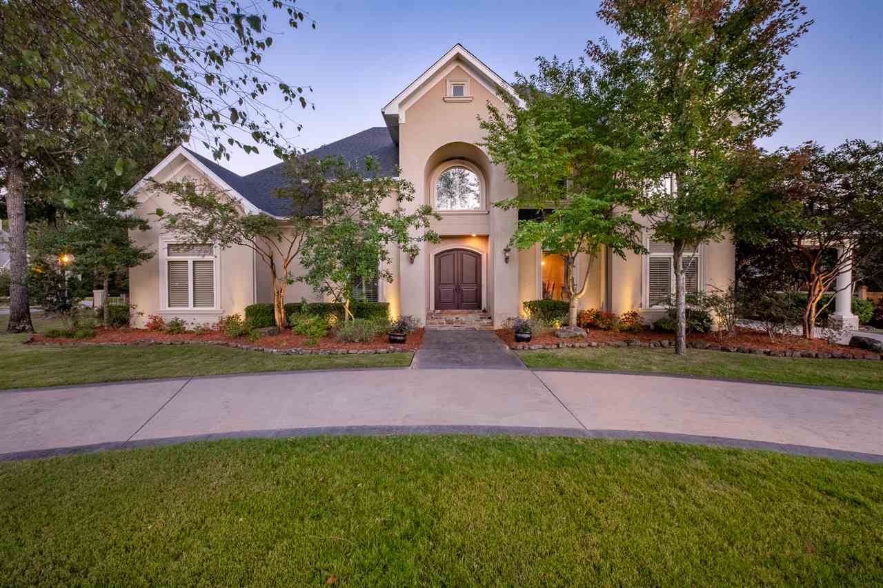 Pristine and stately custom built one-owner home located in prestigious gated Sologne Circle! Well thoughtout floorplan. Huge master suite and guest bedroom on the main floor, as well as media room.Vaulted ceilings in entry and living area. Chef's kitchen w/formal dining and butler's pantry.Beautiful views of the pool from the master, living and breakfast areas. 2 huge bedrooms up and playrooms. Huge corner lot w/over a half acre and beautiful pool area with outdoor cooking area and half bath. COME SEE!!