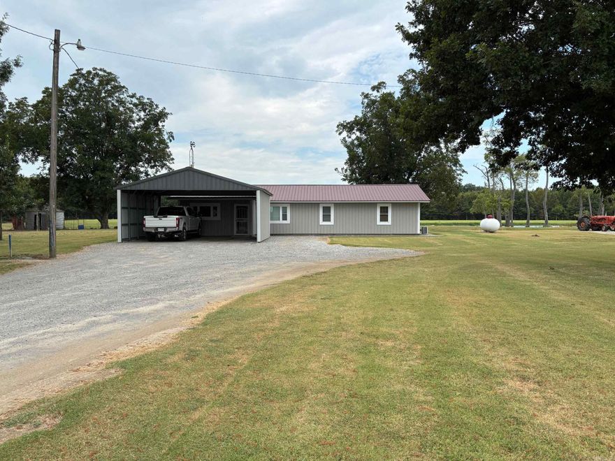 34+- acres with remodeled home 2 bedroom 1 bath covered parking gargage, shed, chicken coop, dog kennel, horse paddock, hay storage, barn, grain bins, parking for dozens of vehicles.  Property backs up to WMA grond touching Bayou Deview.  Excellent Deer and Duck ground located at dead end road, very quiet.  8 ACRE Lake behind house containg  Bass, Bream, catfish, crappie  with Cypress and Tupelo Trees.  Nice well maintained property for hobby farm, critters, Horses, Chickens, Mules, sheep, Fish, Deer, and Ducks.  absolutely stunning property!  Located just Northeast of Hickory Ridge and 29 minutes from Mccrory, Arkansas.