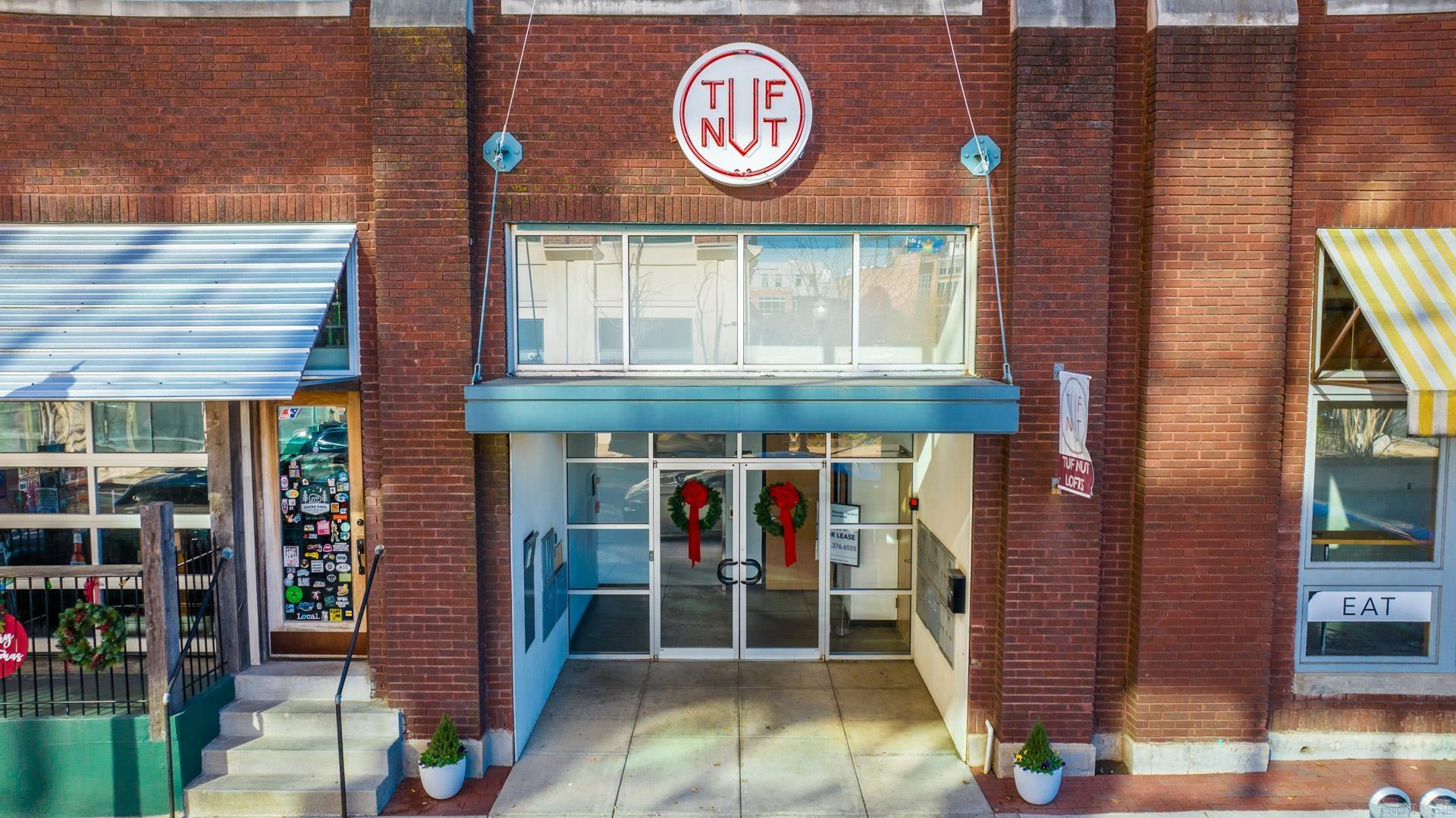 Own a piece of downtown history at the Tuf Nut Lofts. The former Tuf Nut blue jean factory consists of individual studios and loft apartments available to own for the first time. This industrial style loft features exposed brick, concrete floors, tall ceilings, a full kitchen, and full bath, and private bedroom. Controlled access with available garage parking. Pet friendly. Walk to River Market, River Trail, gym, parks, restaurants and more! Agents please see remarks.