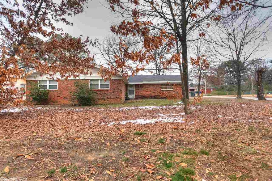 Great home only 4 blocks from UCA!  Newer roof and many updates.  Two living areas, 3 bedrooms, 2 baths