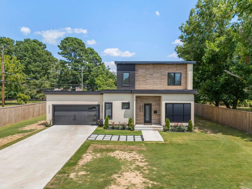 Modern Luxury in the Heart of Downtown Jacksonville!  This beautifully constructed, move-in ready home offers modern design, spacious living, and a prime location.  The main level features 12-foot ceilings and 24x48 marble tile flooring throughout. The primary suite is a true retreat with a freestanding soaking tub, a luxuriously oversized 12-foot walk-in shower, and a large walk-in closet. The open layout includes a spacious living area, a dedicated home office.  You’ll also find a covered patio and plenty of storage, including a guest closet and oversized walk-in utility closet.  Upstairs, the home continues to impress with 10-foot ceilings, three additional bedrooms, a full bathroom, and a versatile game room that opens to a private balcony—perfect for relaxing or entertaining.  Situated on a 0.5-acre lot, this all-electric home offers a rare combination of luxury finishes, functional space, and a central location—ideal for families, professionals, or anyone seeking refined living in a vibrant community.    Truly a beautiful rare gem, this new home is unlike any other! Call today to view 501-368-5351