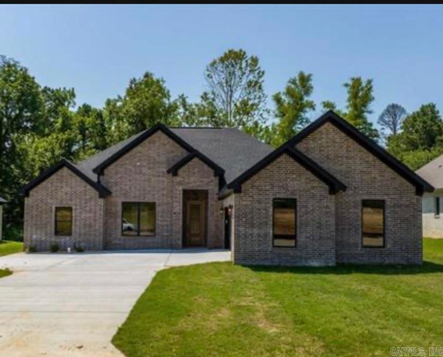 Welcome Home to this beautiful new construction nestled in a new subdivision in the Harmony Grove area.  This home is close enough to all Benton has to offer.  Step through the front door to an open concept living room/kitchen area that's great for entertaining.  The dedicated office space is perfect for those who work from home but could be utilized as 4th bedroom.  This home features a split floor plan so the master suite has plenty of privacy with private access to the covered back patio.  The master bathroom is a private oasis with large walk in shower, gorgeous soaker tub, double vanities and a large walk in closet.  The guest rooms feature a shared jack and jill bathroom.  The laundry room offers plenty of space and a half bathroom is conveniently located near the common area.  Don't miss out on this one! Seller is offering $20,000 concessions with acceptable offer.