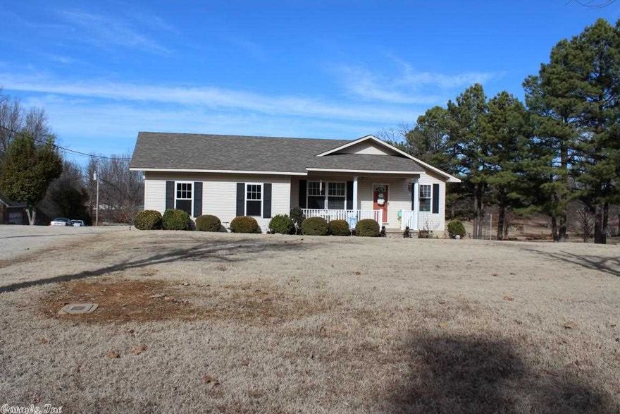 Beautiful well maintained home situated on nearly 2.5 acres. Open family room w/wood laminate floors & ceiling fan. Eat-in kitchen w/breakfast bar & abundant cabinetry. The master suite offers ample closet space, warm color scheme & plush neutral carpet. The additional bedrooms share a guest bath w/updated granite vanity. Many updates including new roof, crown molding, updated HVAC, water heater & updated flooring. Other amenities include above ground pool w/deck, a two car garage, covered porch & workshop.