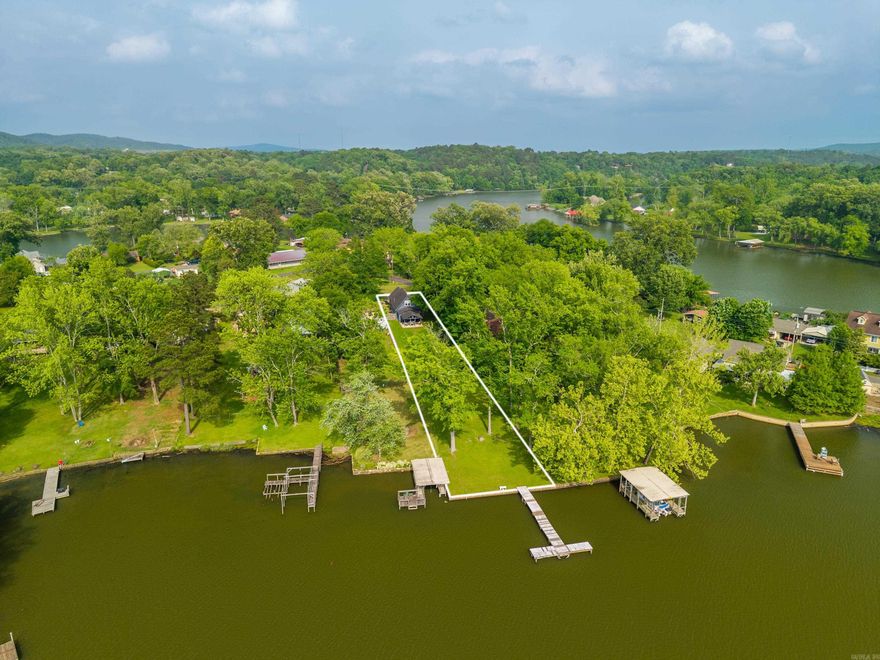 Welcome to your Lake Catherine waterfront dream home! This completely remodeled 3-bedroom, 2-bathroom gem delivers 1,519 square feet of stylish living with large open views that will make your morning coffee taste even better. Every inch has been thoughtfully updated, offering modern finishes and a fresh, inviting atmosphere throughout. Currently operating as an active short-term rental, this property is already a proven income generator perfect for investors or anyone who wants their home to pay for itself while they're away. Conveniently located near Lakeside High School, Kroger, and the renowned Oaklawn Casino, you'll enjoy the serenity of waterfront living without sacrificing everyday conveniences. Whether you're casting a line from your own shoreline, soaking in breathtaking lake panoramas, or counting rental income, this home checks every box. Waterfront properties like this rarely stay available for long schedule your private showing today!