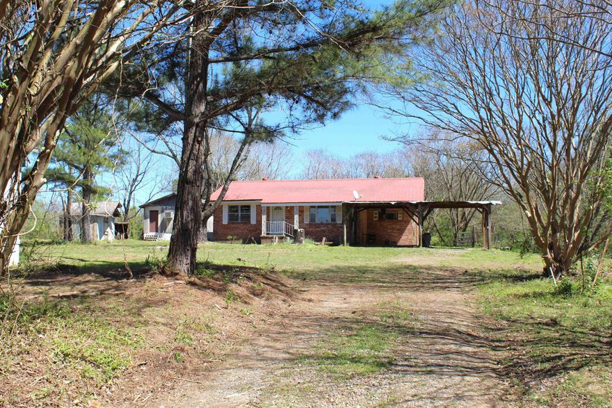 Fixer upper that would make a great homestead.  House is 2 bed 1 bath with an extra-large laundry room that could be used for additional space.  2nd structure has 2 bedrooms and a full bath. Storms cellar, Outbuildings and pens, all this sitting on 4.15 acres! Nice fenced in area that would be great for having animals. So much potential here. No seller property disclosure- seller has never lived at the property. utilities not on/being sold as is