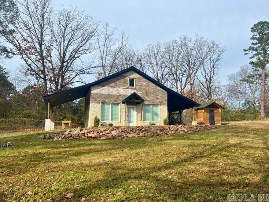 Welcome to 7801 Forest Rd in North Little Rock! Built in 2025, this thoughtfully designed 3-bedroom, 2-bath home offers 870 square feet of efficient, modern living on a spacious 0.36-acre lot. The layout maximizes every inch, providing comfortable living spaces without wasted square footage.  This unique property features two carports, a fully fenced yard, a storage shed/building and plenty of outdoor space for pets, gardening, or entertaining.   Don’t miss your chance to own a truly one-of-a-kind property in North Little Rock!