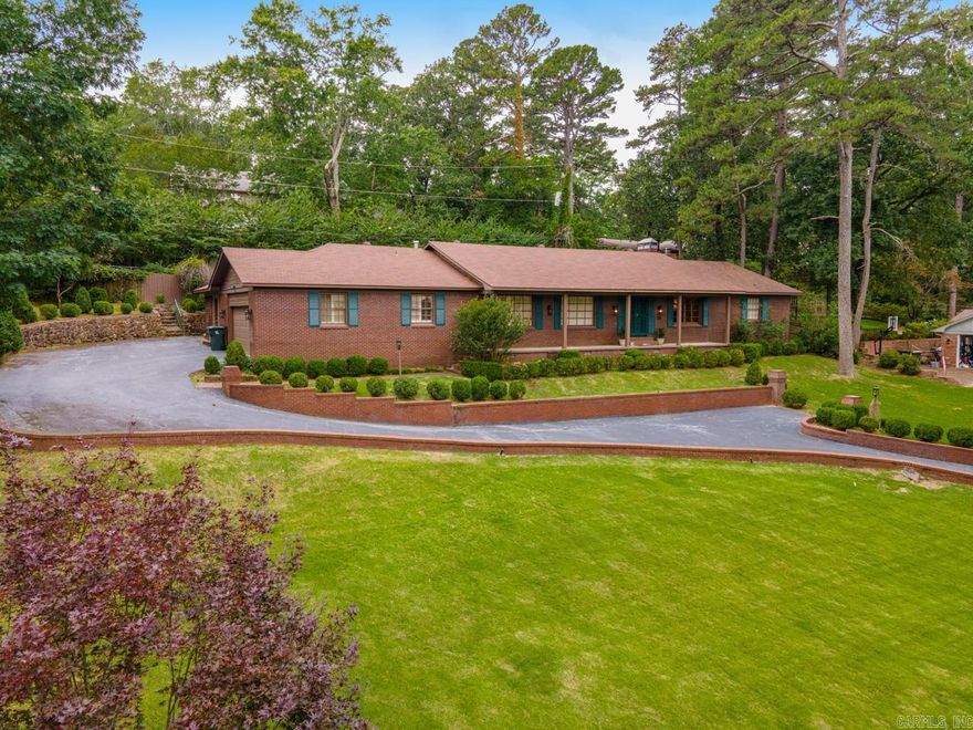 Wonderful opportunity to own this Mid Century Ranch in River Ridge & make it your own. This 3 BR, 3.5 BA one-owner home is ideal for entertaining with a large, open kitchen, dining and living area. Beautiful hardwood floors flow through this space which also includes a large fireplace. For formal entertaining, there are also dedicated living and dining rooms. The kitchen has abundant counter space and storage as well as a large island, gas stove, double oven and indoor grill. The primary suite features a fireplace and an en suite with double vanities and walk-in shower. Both bedrooms with dedicated full bathrooms. Large, tranquil and private back patio that features a gazebo. Over 300sf workshop with AC not included in square footage. Beautifully landscaped half acre yard with irrigation system. Jefferson Elementary school district! Home being sold "AS-IS". Schedule your showing today!