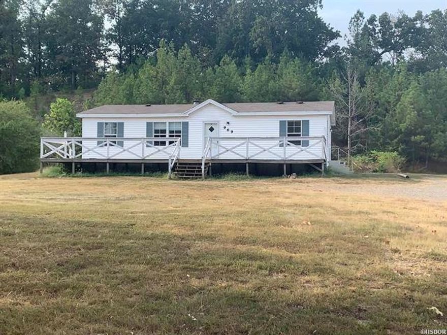 3/2 on nearly an acre in Lake Hamilton School District. Move in ready. Large front deck, plenty of parking. Selling AS IS but buyers are welcome to do inspection.