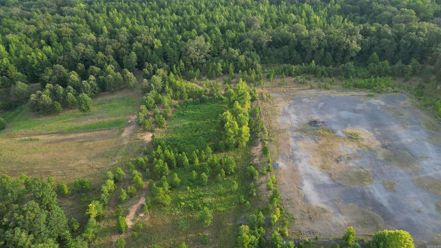 Come check out this remarkable land before it gets away. Discover the perfect blend of serene meadows and lush woodlands on this stunning 40-acre property in the rolling hills of northern Faulkner County. Nestled amidst gentle hills, this land offers both open spaces and shaded areas, ideal for hunting, fishing, farming, homesteading or just creating your own haven away from the hustle and bustle. Despite its secluded feel, the land is conveniently located less than 10 miles from Greenbrier, AR, providing easy access to shopping, dining, and other amenities. For aviation enthusiasts, the property boasts access to an FAA-registered grass airfield with a 2,800-foot runway, perfect for private planes and small aircraft. Also located on the property is the gravel pad that was formally used by the oil company, but has been released back to the Seller. This unique property is a rare find, offering the tranquility of country living with the convenience of nearby town amenities. More adjoining land can be purchased as well. Don’t miss the chance to own a piece of Arkansas paradise!  **Call today to schedule a viewing and experience the peaceful beauty of this remarkable land.**