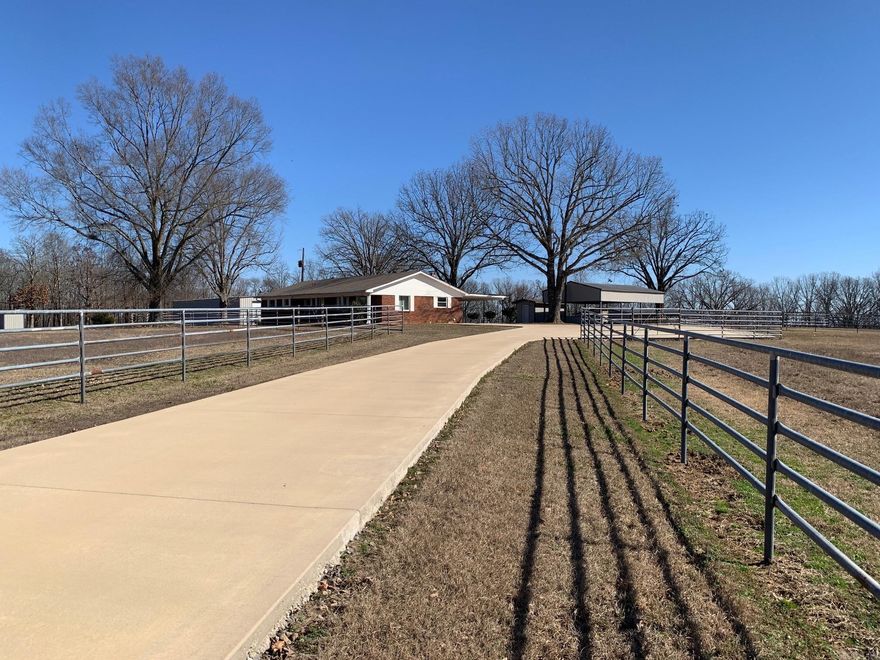 150+- Hilltop Custom Built Mule/Horse Farm with a renovated 3/2 home(1727 square foot) with Barns, Pipe Fencing, Ponds, Creek, Pasture, Timberland, and outstanding views! 3 seperate pastures and two ponds around the home.  Awesome, Beautiful, Manicured, Inspiring, Peaceful, Quiet, Amazing, & Well Done Ranch built to last with attention to detail in all aspects of this little piece of all you would ever want in a place to call home.  Words are hard to come by in describing this new/never before listed Horse ranch.  The owners are a husband/wife team that built this as a weekend retreat for their beloved Mules and their passion for the these animals shows up in the design to care for them!  Quality has a name and it is located at 6322 Black Hill Road just north of Quitman, Arkansas.  6 Ponds, 1 creek, Pastures, and Mature Hardwoods, 2250 square foot concrete floored Barn with lean to covered porch, 40x100 square foot pole barn tack room, 39 x 62 square foot shed, Pipe fencing on driveway and surrounding home, solar panels/ inverter/ propane generator/ batteries ensure you are never without electricity, pole shed, loaf barn, and uncovered round pen, x large carport, brick home.