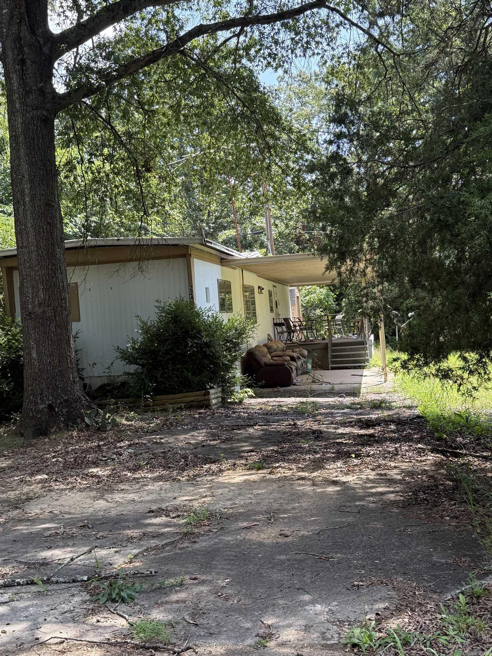 2 BEDROOM 2 BATHROOM FIXER UPPER ON TWO LOTS. SOLD AS IS. PLEASE SEE AGENT REMARKS