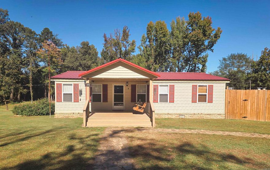 You can't go wrong with this home on this lot!!   The home has been superbly maintained and well-loved. Over the last year, the home has had new paint throughout, new flooring in the hall bathroom and primary closet, a new privacy fence in the back yard with a wonderful new roof over the back deck, a new water heater, and concrete under the carport. Power was run to the shop, and a new drive was built to access the barns at the back of the property.   If you are looking for a little bit of space, but just minutes from I-40, Russellville, Pottsville or Dardanelle - don't miss out on this one.   *See agent remarks*