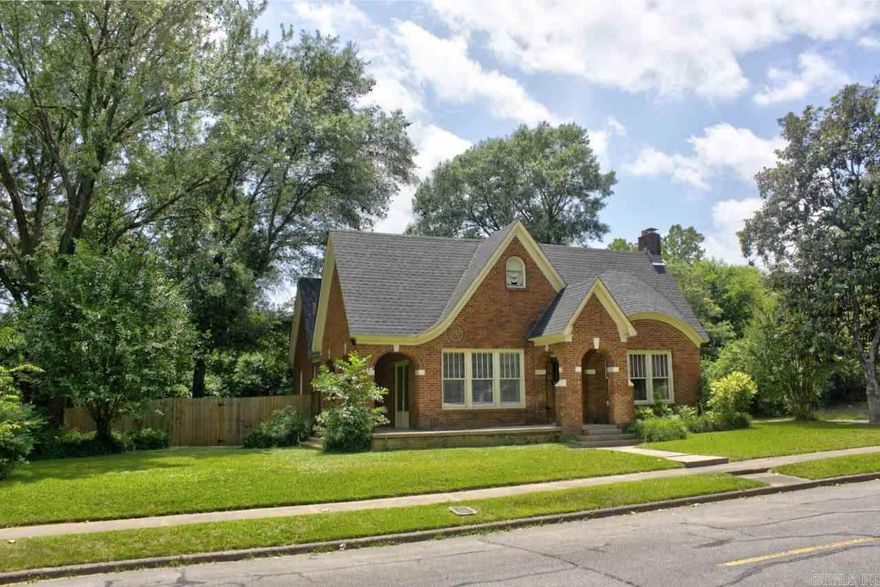 Beautiful, historic home with stunning appeal that still has lots of original features including sun porch, brick arches,12’ ceilings & hardwood floors but has had recent updates such as new paint/fixtures, replacement windows, HVAC and new roof within the past couple of years. Study is breathtaking with lots of natural light & french doors to Living Room & to the exterior wrap-around side porch.  Kitchen boasts of tall cabinetry, quartz countertops, Stainless appliances, gas range & full pantry. Huge Primary Suite with full bath w/jet tub, beveled glass doors to Juliet balcony, add'l loft area w/walk-in closet. 3 bedrooms / 1 bath on main floor. One bedroom has it's own private, exterior entrance. Privacy fenced backyard with patio dining area & storage shed. On 1/3 acre lot with 4 off-street parking spaces!