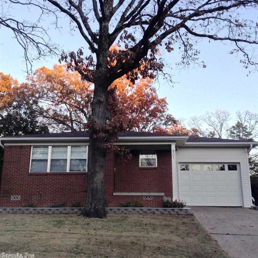 Super sophisticated mid-town home. Updated with 1 car enclosed garage, hard to find in mid-town! Beautiful, original and refinished oak wood floors, gorgeous granite counters with custom back splash and cabinets in kitchen. Crown molding, custom paint colors-very pretty! Both bathrooms have been updated. Too many updates, including energy efficient updates to list!