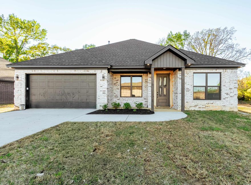 Jacksonville New Home! Enjoy this stunning new construction by Charles Anderson Homes! This residence boasts every luxury you could desire. The foyer opens up to a spacious Great Room with an inviting open floor plan and a stylish recessed electric fireplace. The kitchen and dining area showcase beautiful Quartz countertops, a range alcove with surround, and a large island that serves as additional dining space. Enjoy exquisite ceiling and cabinet fixtures throughout the home. The private Master Suite features double vanities, luxury vinyl flooring, a garden tub with upgraded tile surround, a custom tile shower, and two walk-in closets. On the opposite side, you'll find two bedrooms along with a guest bath and laundry room. Step outside to the covered porch, complete with an outdoor fireplace for cozy evenings. Plus, enjoy peace of mind with a One year Home Builder's Warranty! PROFESSIONAL PICTURES COMING, COMPLETION DATE APRIL 1, 2026