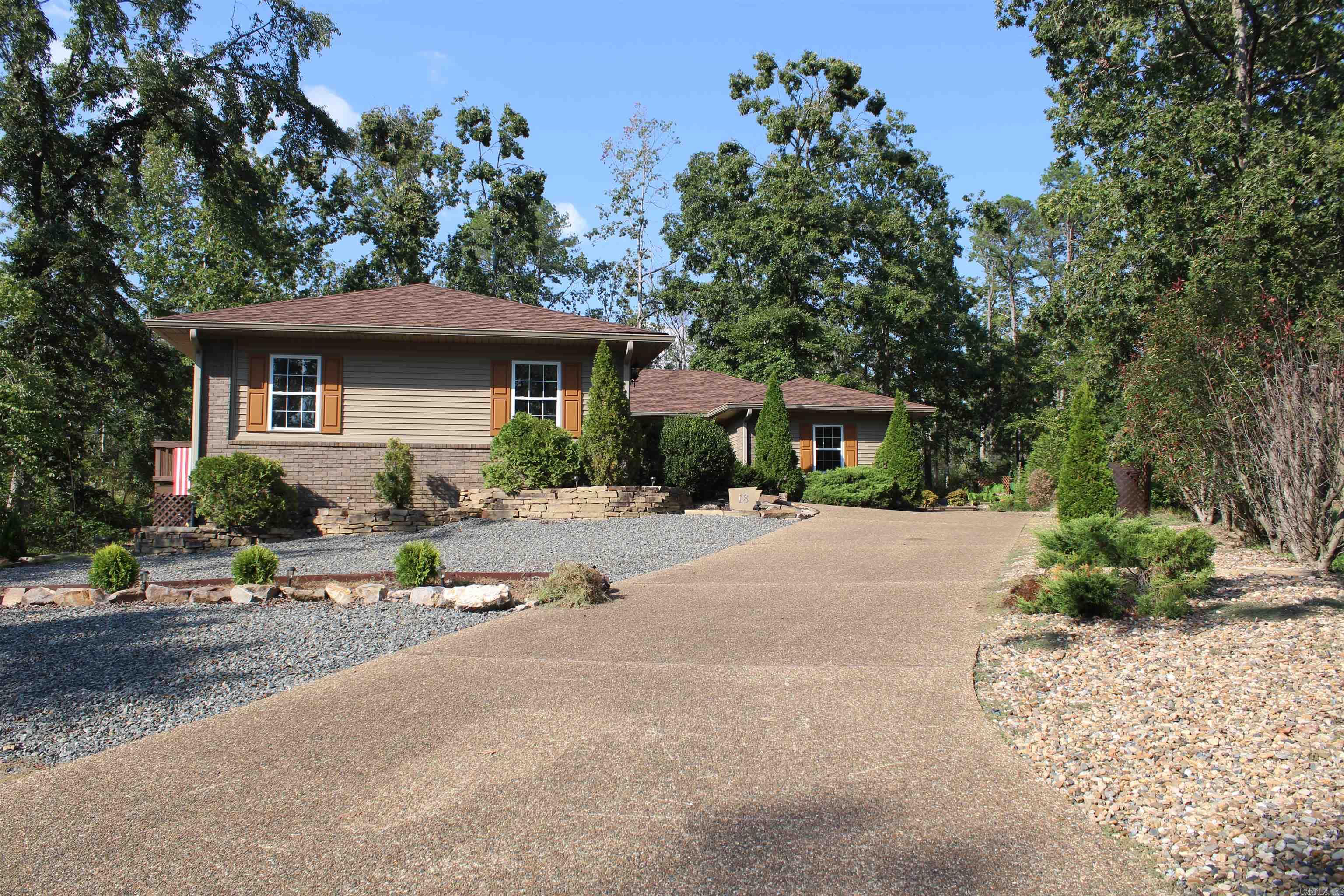 Very cozy home, tucked in a cul-de-sac with great backyard views. Enjoy 2 sunrooms, one with skylights, could be used as a den, and a beautiful backyard patio area with a 2 person hot tub. Plenty of backyard space. Great open living room and dining area across from kitchen. Large primary bathroom with a double vanity, walk-in closet, walk-in shower, and tub. Spacious 2-car garage. Side access door in garage. Driveway having repairs/replacement done within the next week.