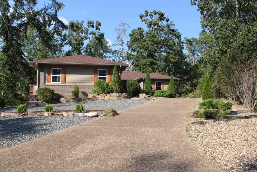 Very cozy home, tucked in a cul-de-sac with great backyard views. Enjoy 2 sunrooms, one with skylights, could be used as a den, and a beautiful backyard patio area with a 2 person hot tub. Plenty of backyard space.  Great open living room and dining area across from kitchen. Large primary bathroom with a double vanity, walk-in closet, walk-in shower, and tub. Spacious 2-car garage. Side access door in garage.    Driveway having repairs/replacement done within the next week.