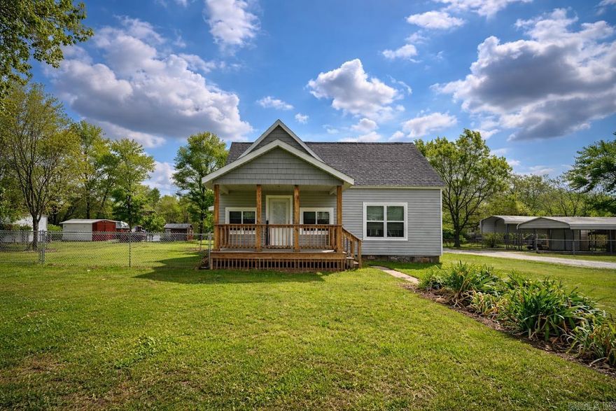 This beautifully updated 3 bed/2 bath home offers the perfect blend of timeless charm and modern convenience. While it maintains the character of a classic property, it has been thoughtfully and extensively remodeled inside and out. Recent updates include a new roof, energy-efficient windows, new porches, updated flooring, stylish fixtures, and fresh paint throughout—providing both comfort and peace of mind. The home is truly move-in ready, featuring a well-crafted renovation that enhances both functionality and aesthetic appeal. Enjoy relaxing on the inviting back porch—an ideal spot for morning coffee or unwinding in the evening. A covered metal carport at the rear of the property offers convenient access directly to the porch and into a practical laundry/mudroom area, adding everyday ease. Ideally located, this home is just minutes from a local elementary school, nearby parks, shopping, and offers quick access to the national forest for outdoor recreation—all just a short drive away. Don’t miss the opportunity to own a home that combines charm, quality updates, and a prime location. Schedule your showing today and experience it for yourself!