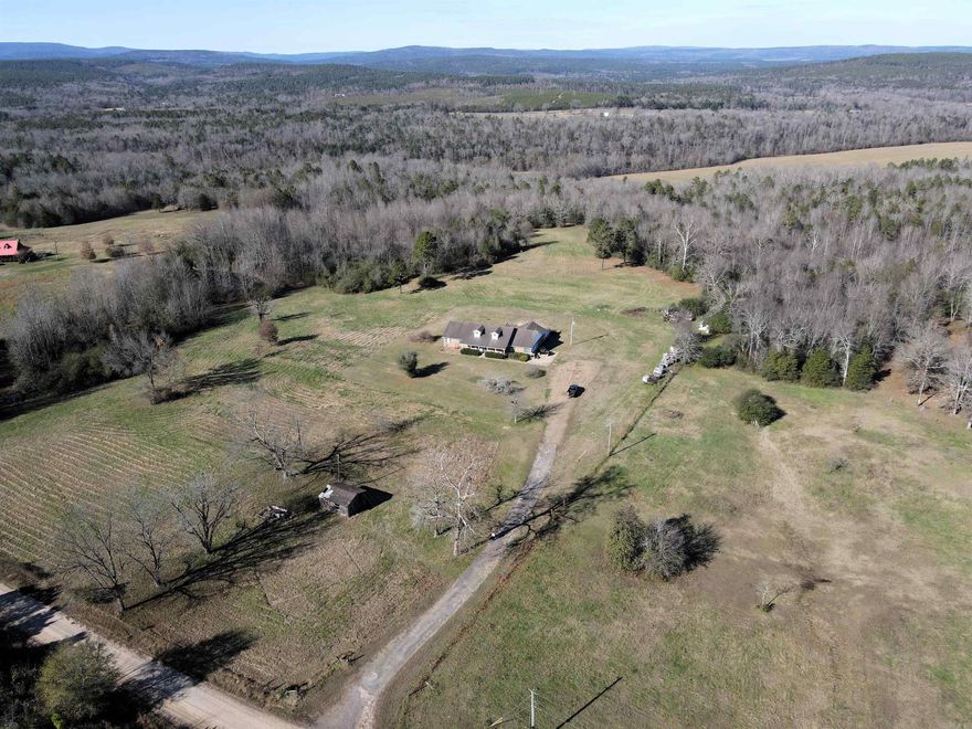 - 26 +/- acres of timber - 8 +/- acres of pasture - County road frontage - Heavy mast producing trees - 2680 square foot home - Great topography - All weather creek - Multiple seasonal waterfalls - Incredible hunting  - 23 miles to Clinton - 21 miles to Morrilton