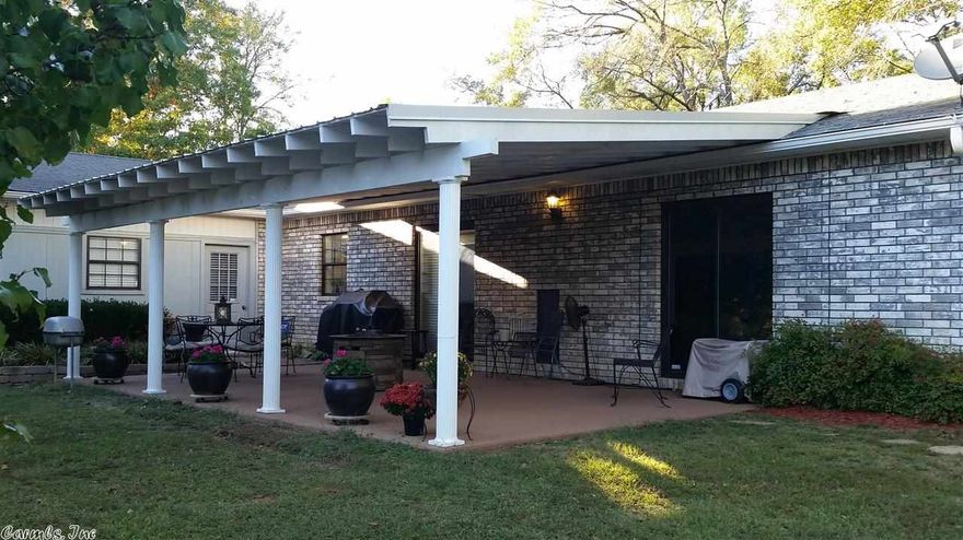 Open, but cozy feel, 4 bedroom, 3 bath brick home on 5 acres with split floor plan. This property also has a 2 car carport The home has been completely remodeled and has too many features to name! Truly a must see!  Plus it is located close to -Lake Hamilton School!