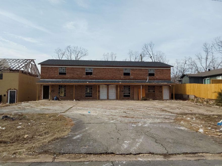 Great investment property!! This 4 unit multi family unit was hit by the tornado. It was rented up until the damage. Property needs to be rehabbed. Before the damage, this complex was a great property! Let your imagination go wild and create a great new property. Once it is complete, these units will rent quickly!! This property is being sold AS IS, WHERE IS! Purchaser responsible for any and all demolition. R5 zoning. Agents please see remarks.