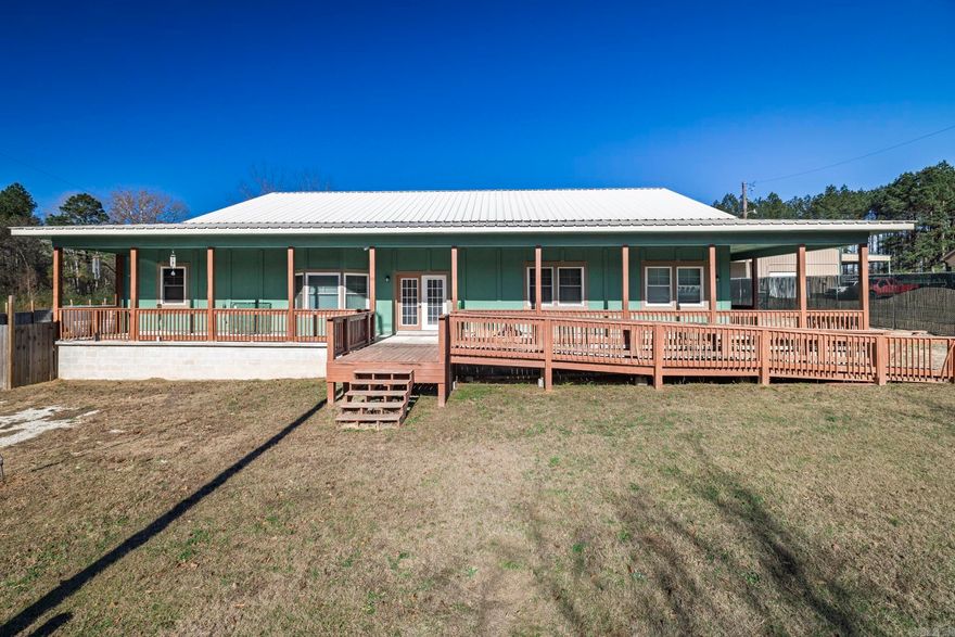 Located just outside the Donaldson city limits in the Ouachita School District, this thoughtfully designed custom-built home on 3.15 acres offers quality construction, flexible space and modern efficiency. The exterior features LP Smart Siding with a 50-year warranty, a welcoming wrap-around porch, and a spacious back deck overlooking the backyard. A storage shed and whole-home backup generator for added convenience and peace of mind.  Inside, the home opens to an impressive 30x49 great room with 10-foot ceilings, creating an open and inviting space ideal for everyday living or entertaining. The layout includes 3 bedrooms, 2 full bathrooms, and 2 bonus rooms, offering options for a home office or guest space. One bonus room has private exterior access and an unfinished bathroom, with materials already on site to complete it.  The primary suite features a soaking tub, walk-in double shower, and a walk-through closet with direct access to the laundry room. Additional highlights include a 5-ton HVAC system, spray foam insulation, tankless on-demand hot water heater, LED lighting, wired fiber optic internet, and 10-foot ceilings. Bar stools, ice machine, and security system convey