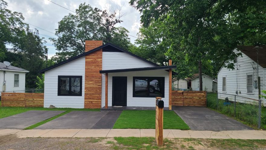This newly remodeled home is a must see. It features 1,350 sq ft of living space, with 3 bedrooms, 3 bathrooms, and beautiful laminate floors throughout.This open concept home features brand new appliances, an electric fireplace, and a large fenced in backyard with a storage shed. Come see this home today!