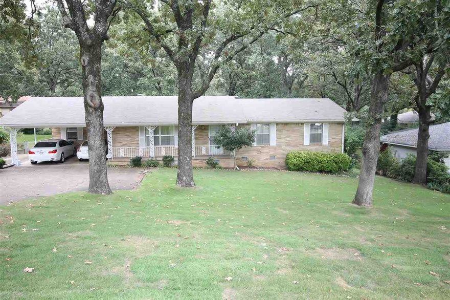 One owner home in pristine condition! Home features two living and dining areas. Nice sized kitchen with microwave, double oven, dishwasher, and plenty of cabinet space. Oversized flat backyard with beautiful sod. Workshop under house with additional storage. Fully fenced, sprinkler system, gas grill. New roof, energy efficient features including insulated windows and doors, and storm windows.