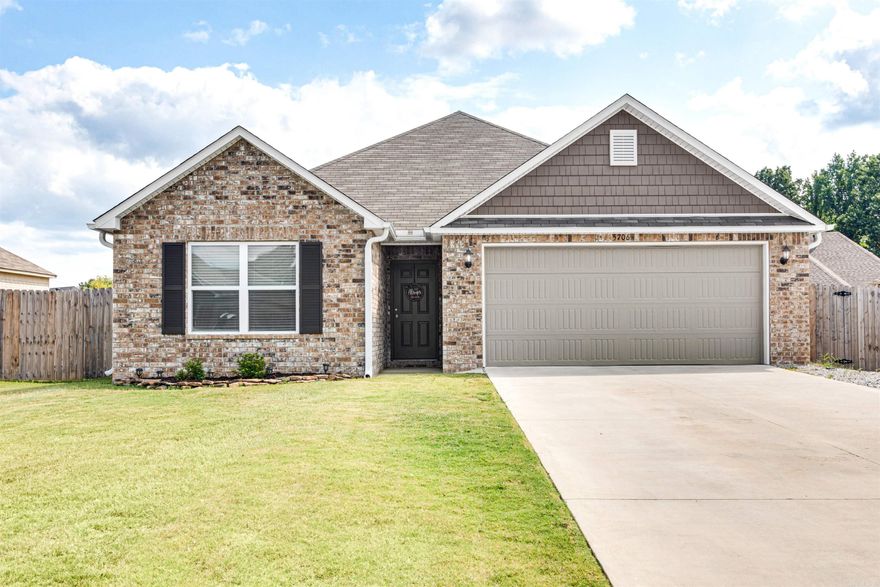 Modern meets comfort in this all-brick three-bedroom, two-bathroom home. It offers a generous living space of approximately 1600 sq. ft. This home boasts a seamless open floor plan where the heart of the home features white cabinets, stainless steel appliances, and an island that serves as both a focal point and additional storage. Upgrades include luxury vinyl plank flooring throughout and faux wooden blinds for privacy while adding a touch of sophistication to every room. Step outside into your backyard enclosed by a wooden fence. Ample parking is provided with additional chat parking thoughtfully added by the sellers to accommodate guests effortlessly. The sellers have also added gutters to the home making it truly move-in ready. This meticulously maintained home exudes pride of ownership from its single owner since construction. This home qualifies for zero down financing! Ask for more details.