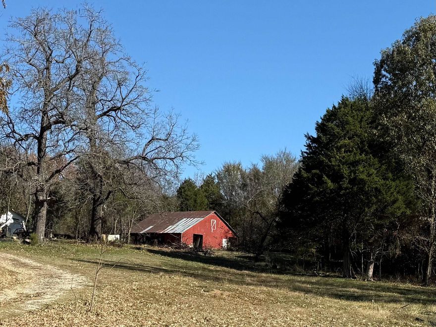 Beautiful rolling hill for home place on pavement with water and electric available.