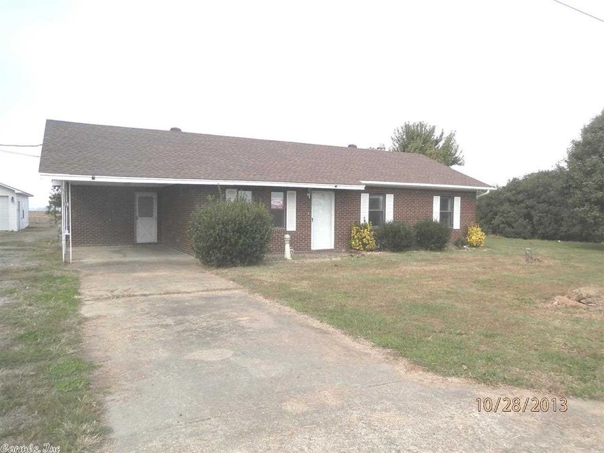 Nice 3 bedroom, 1 bathroom family home with spacious family room and enclosed porch.   Large kitchen with breakfast bar.  Attached 1-car carport plus detached 2-car garage for extra workshop space.  ** Please submit the Information Sheet found in Associated Docs with all offers.